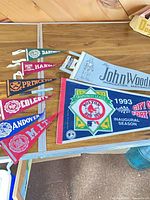 Group shot of all eight pennants on table