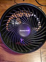 Front view showing Honeywell logo and spiral grill