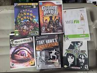 Front view of all six game cases