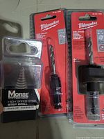 Milwaukee 3⁄8 in arbor, Milwaukee 7⁄16 in arbor, Morse step drill in packaging