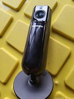 Front view showing lens, logo, overall design