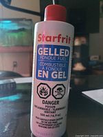 Front view showing brand, product type, volume and hazard symbols