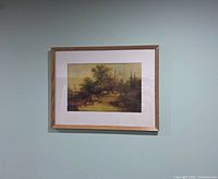 Framed print hanging on wall