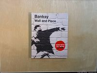 Front cover of the Banksy Wall and Piece book