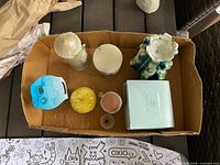 Overview of all candles in cardboard tray