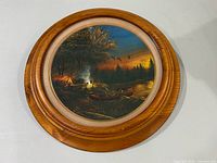 Front view of framed porcelain plate showing artwork