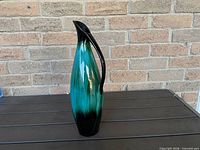 Full view of tall green-to-black BMP vase