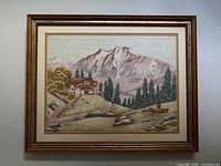 Front view of framed Bunka embroidery landscape