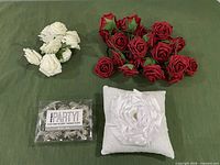 All items: pillow, bells package, red and white roses
