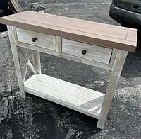 Full view of console table front with drawers and shelf