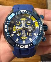 Front view of Invicta chronograph watch displaying dial, bezel and strap