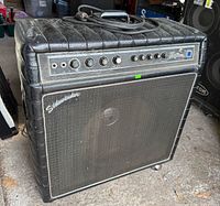 Full front view of Kustom Sidewinder amp showing padded vinyl, grill cloth, casters, and top handle