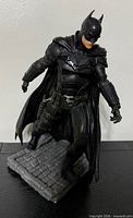 Front view of Batman figure on base