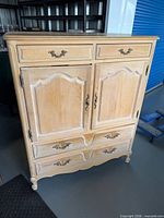 Front view closed dresser showing style and hardware