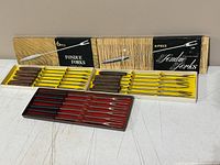 All three boxed fondue fork sets displayed