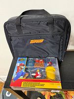 Front view of Nintendo Power carry case and sealed diorama set
