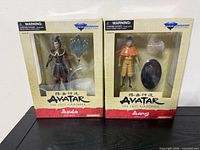 Front view of both boxed Azula and Aang figures