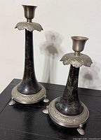 Pair of candlesticks front view