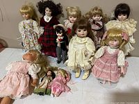 Group view of all dolls laid out on surface