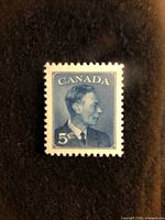 Front view of blue 5¢ King George VI stamp