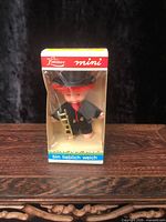 Front view of boxed Limmer Mini chimney sweep figurine