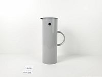 Full front view of grey Stelton EM77 jug
