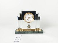 Front view of Bulova Tempest mantel clock showing full design and materials