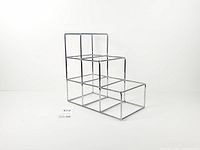 Full view of chrome stepped wine rack left side