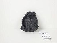 Front view showing full ashtray, figure detail, size card