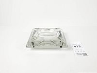 top view showing square shape, central basin, faceted edges