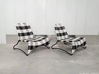 Front three-quarter view of both lounge chairs