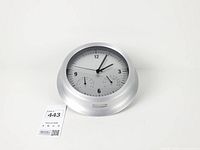 Front view of Nexxtech round wall clock showing time and both sub-dials