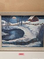Front view of framed acrylic winter landscape painting