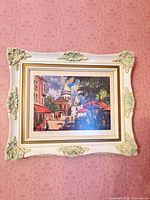 Full view of framed canvas print on wall