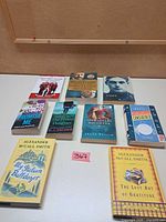 All ten books laid out on table