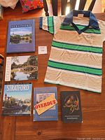 All items laid out showing titles and shirt