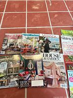 Group shot of all magazines laid out on tiled floor