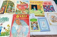 All nine books laid out showing front covers and titles