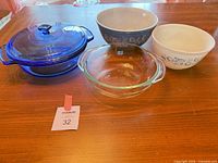 Group view of two mixing bowls, clear baking dish and cobalt lidded casserole