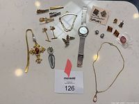 Group shot showing all jewellery and accessories laid out on table