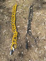 Both yellow and black cords coiled on ground to show full lengths