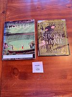 Front view of both hardcover books side by side