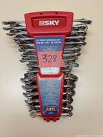 Front view of SKY red rack holding 32 wrenches