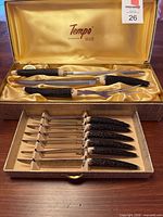 Open presentation box showing carving set and steak knives