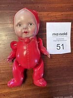 Full front view of articulated red celluloid doll