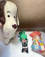 Group view showing Snoopy, alligator, Scottie dog and rag doll