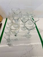 Group view of entire 15-piece stemware lot on table