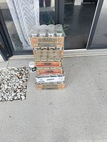 Stacked sealed cases of Bernardin Mason jars