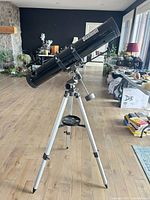 Full view of Bushnell telescope on equatorial mount and tripod