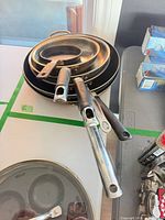 Stacked pans showing handles and exterior material